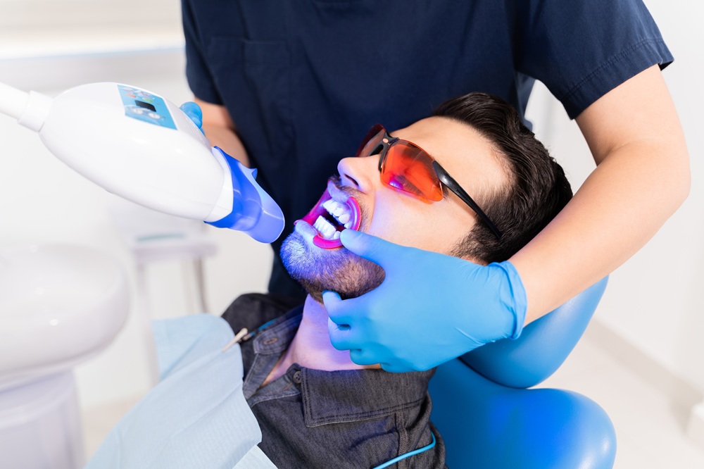 A patient undergoes professional teeth whitening treatment to achieve a brighter and more radiant smile - Dentist in San Pedro CA
