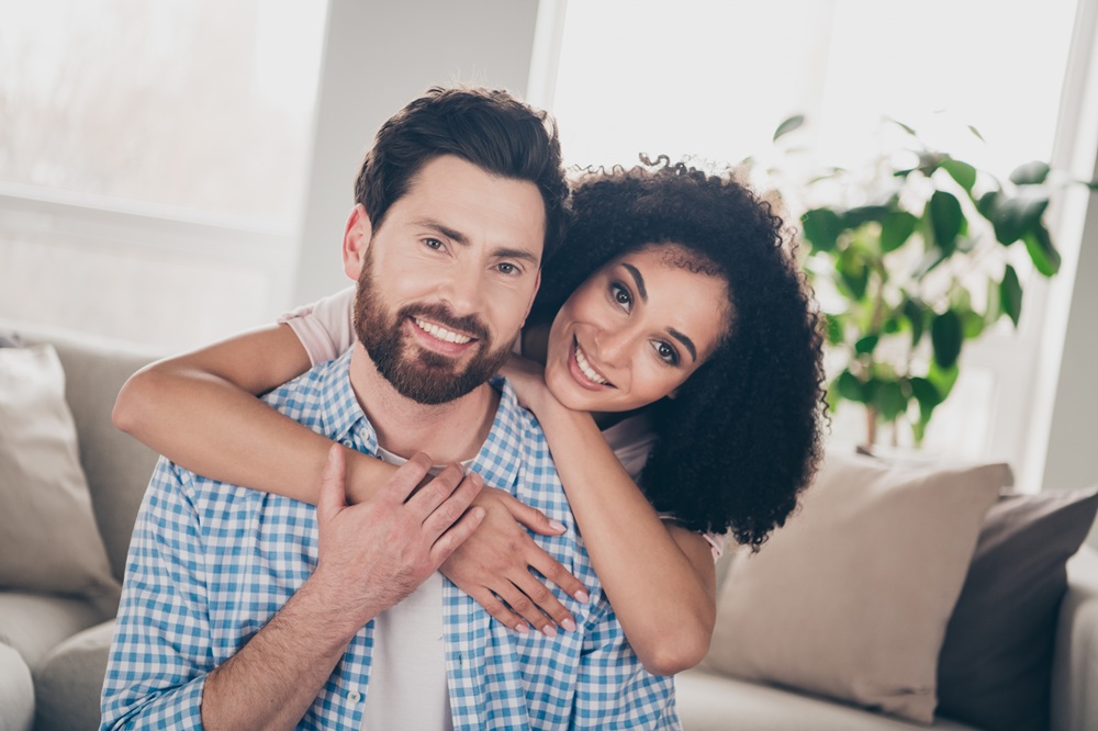 A smiling couple enjoying time together, representing long-lasting oral health and confident smiles through comprehensive dental care – Dentist in Redondo Beach.