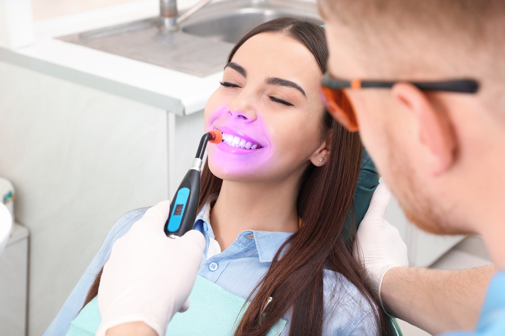 Female Patient Receiving Laser Dental Care – Laser Dentistry in Torrance CA A patient relaxes during a laser dental treatment that promotes faster recovery, reduced discomfort, and improved oral health outcomes. – Laser Dentistry in Torrance CA